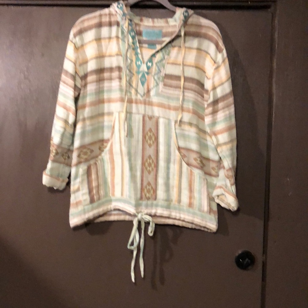 Tasha linen top with hood and embroidery.